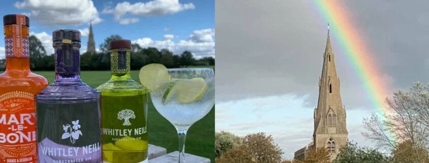 Bottles of gin in sun Bottles of gin outside and also the church under a rainbow