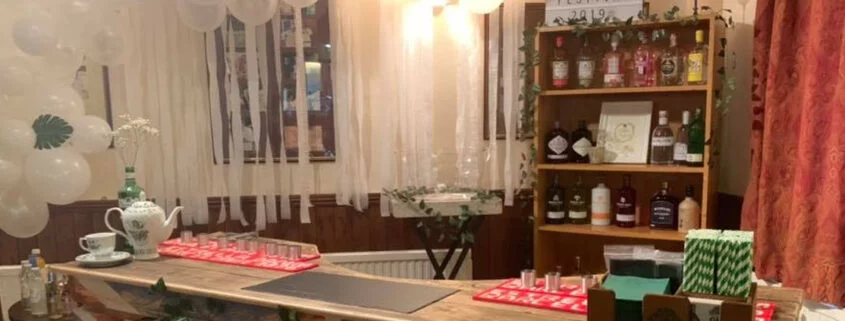 Gin Festival Bar Bar setup to serve gin and tonic with balloons in background