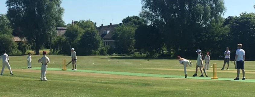 Youngster bowling to another young cricketer