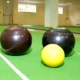 Bowling balls on playing matt